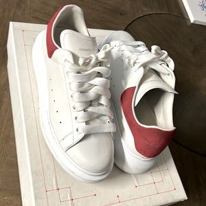 Red and white slightly worn Alexander McQueen size 8 in women.
